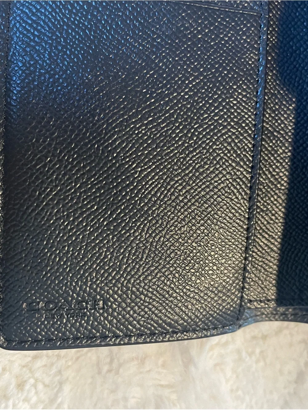 Coach Black Saffiano Leather Phone Wallet with Gold Logo